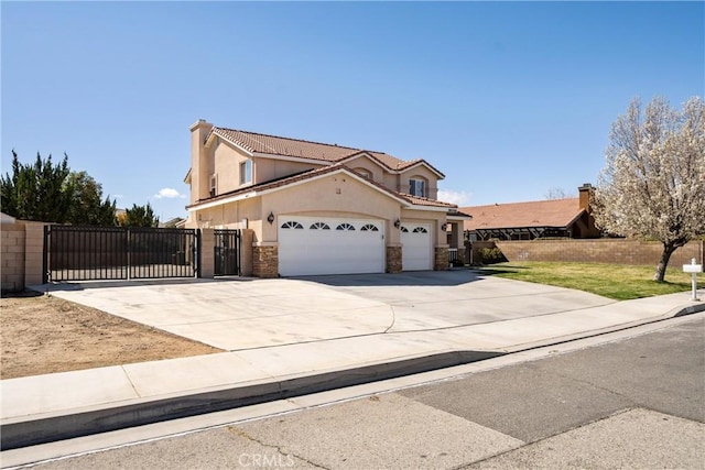 view of front facade featuring stucco siding, concrete driveway, a gate, stone siding, and a tiled roof