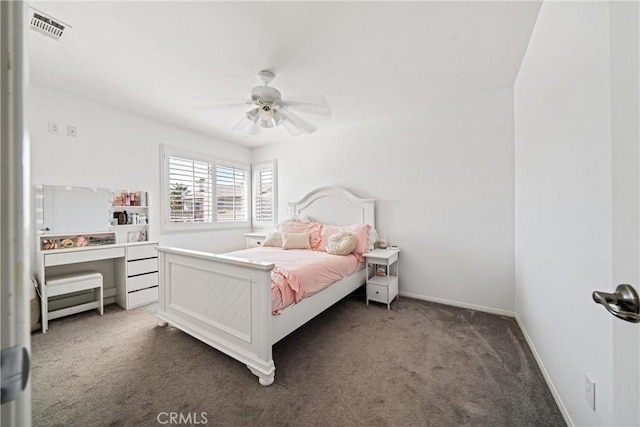 bedroom featuring carpet floors, baseboards, visible vents, and a ceiling fan