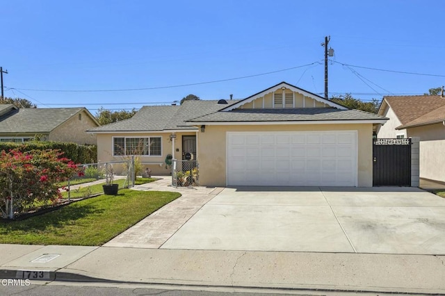 ranch-style home featuring stucco siding, driveway, fence, a shingled roof, and a garage