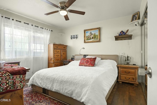 bedroom featuring ceiling fan and wood finished floors