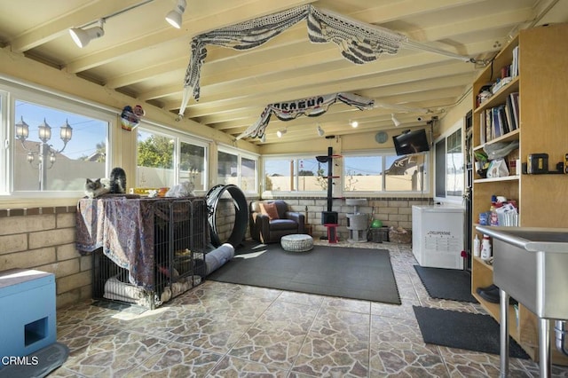 exercise area with stone finish flooring