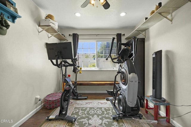 exercise room featuring ceiling fan, baseboards, wood finished floors, and recessed lighting