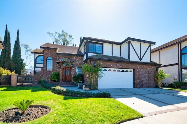 tudor house featuring brick siding, concrete driveway, an attached garage, a front yard, and fence