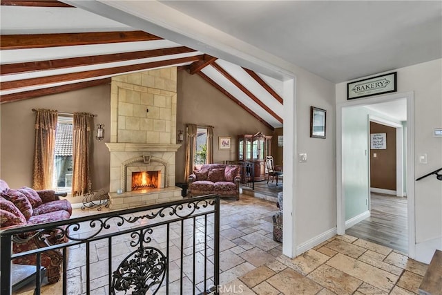 160 Summit Rd, La Verne, CA 91750 - living area with a tiled fireplace, stone tile flooring, and baseboards