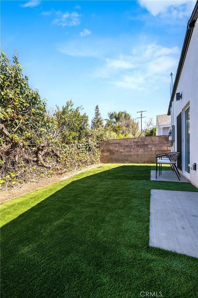 view of yard with fence