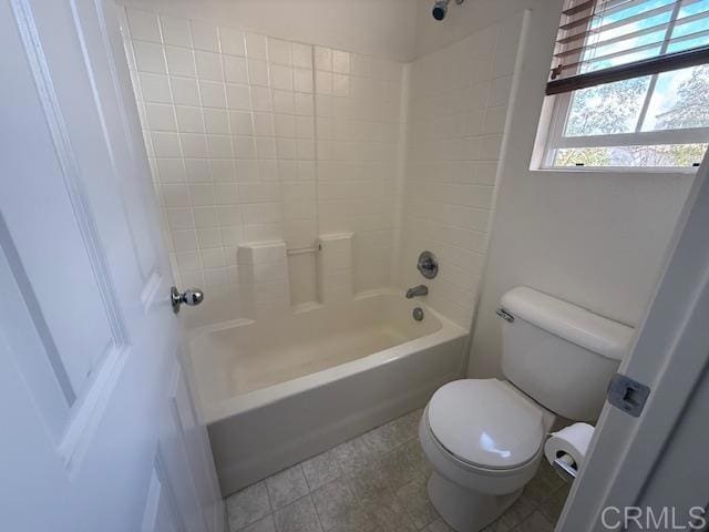 full bath featuring bathing tub / shower combination and toilet