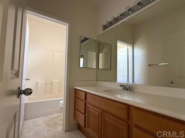 full bathroom with vanity and toilet