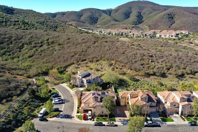 bird's eye view with a residential view and a mountain view