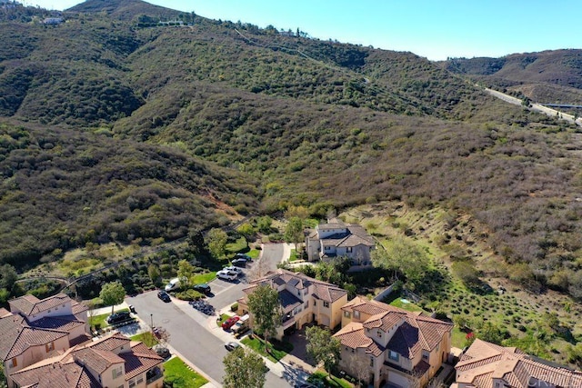 birds eye view of property featuring a residential view and a mountain view