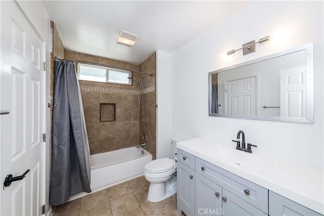 full bath featuring shower / tub combo, vanity, toilet, and tile patterned floors