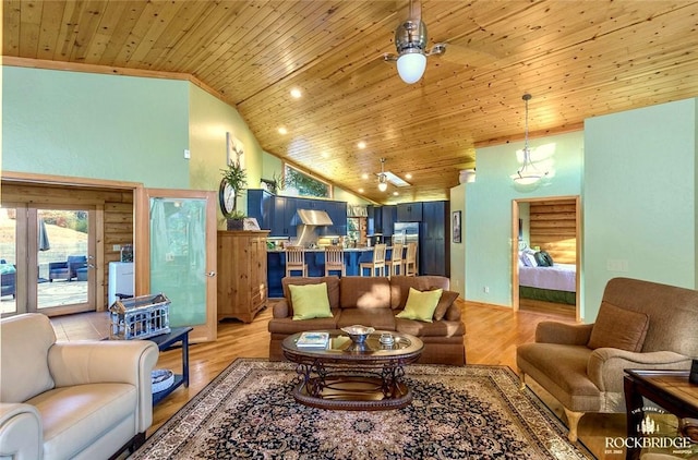 living area with high vaulted ceiling, light wood-type flooring, and wood ceiling