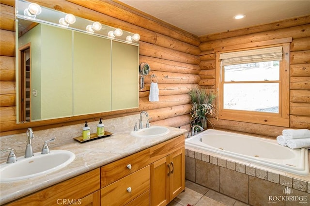 bathroom with a garden tub, double vanity, rustic walls, and a sink