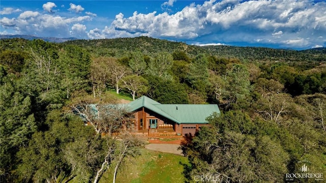 bird's eye view with a view of trees