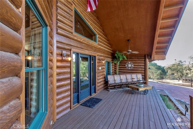 wooden terrace with ceiling fan