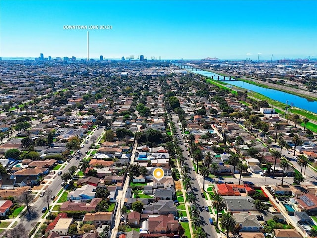 aerial view with a water view and a view of city