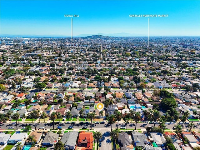 drone / aerial view with a residential view and a mountain view