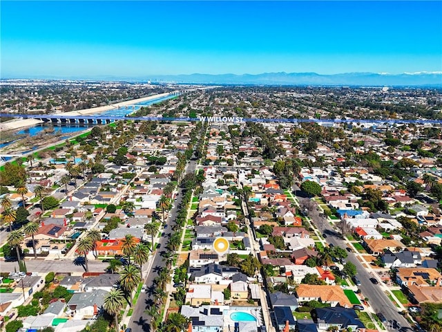 aerial view featuring a residential view and a water and mountain view