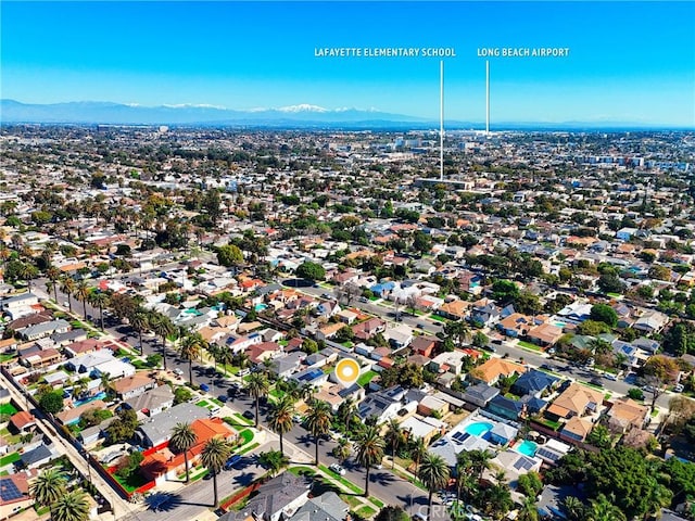 drone / aerial view with a residential view and a mountain view