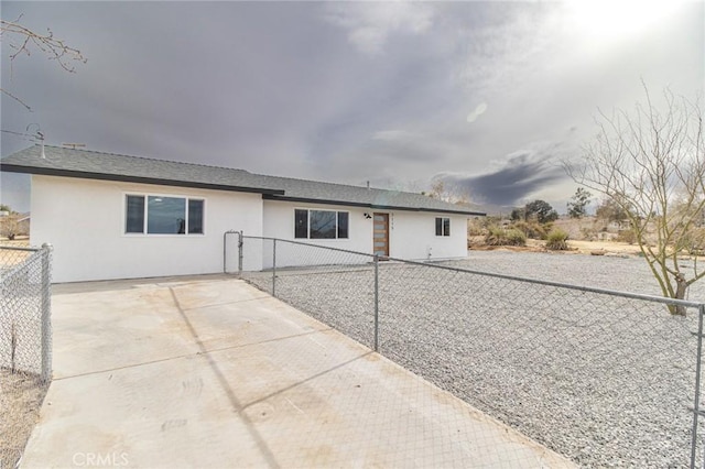 ranch-style home with fence private yard, a patio area, and stucco siding