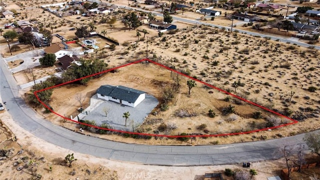 drone / aerial view with a desert view