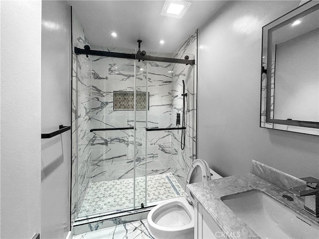 bathroom featuring marble finish floor, vanity, a marble finish shower, and toilet