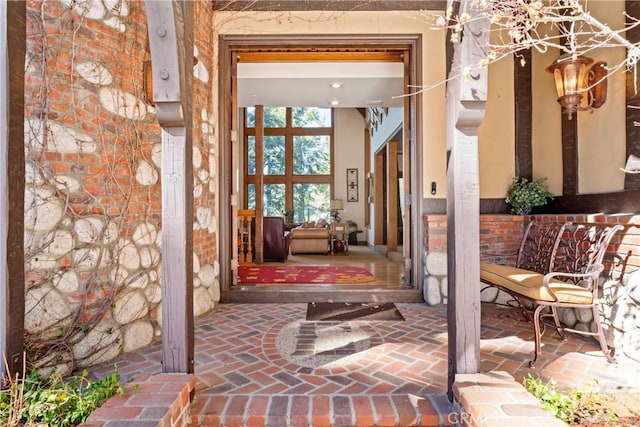 entrance to property with brick siding