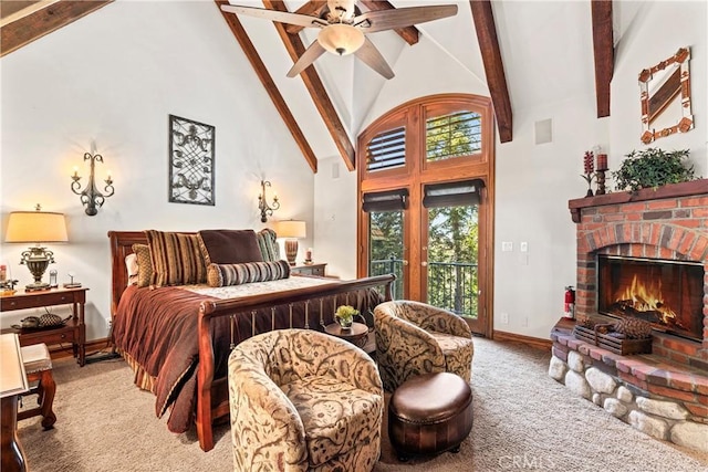 bedroom with access to exterior, carpet, a brick fireplace, and beam ceiling