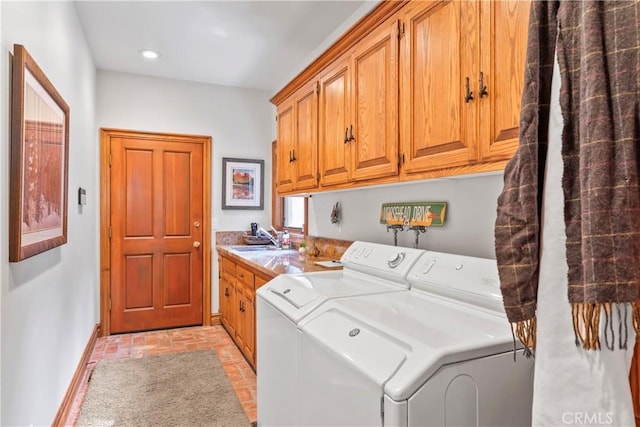 145 Pheasant Run, Lake Arrowhead, CA 92352 - laundry room with cabinet space, washer and dryer, brick flooring, and recessed lighting
