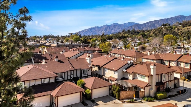 bird's eye view featuring a residential view and a mountain view