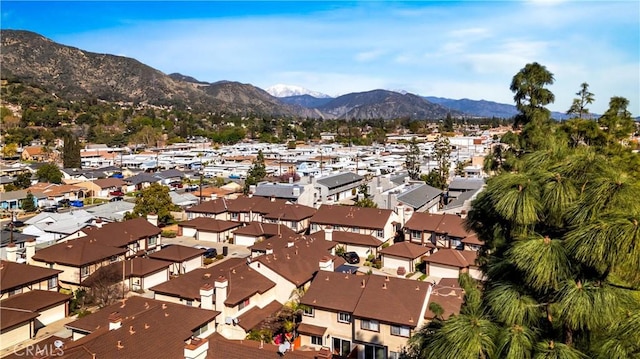 aerial view with a mountain view and a residential view