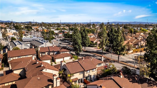 aerial view with a mountain view and a residential view