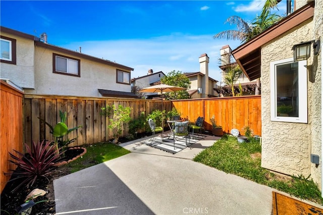 view of patio with a fenced backyard