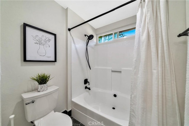 bathroom featuring toilet and shower / bath combo