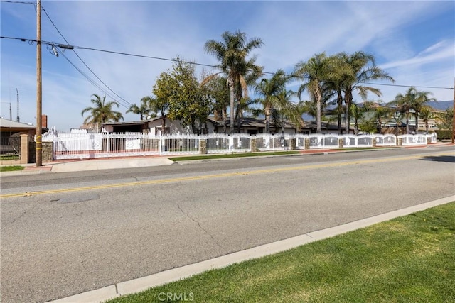 view of street featuring sidewalks and curbs