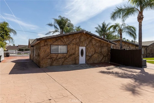 view of front of house with fence