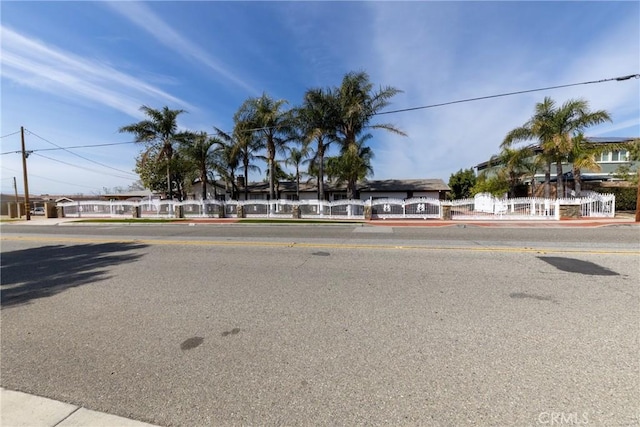 view of road featuring curbs and sidewalks