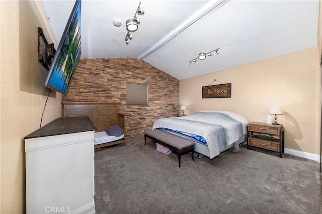 carpeted bedroom featuring vaulted ceiling and baseboards