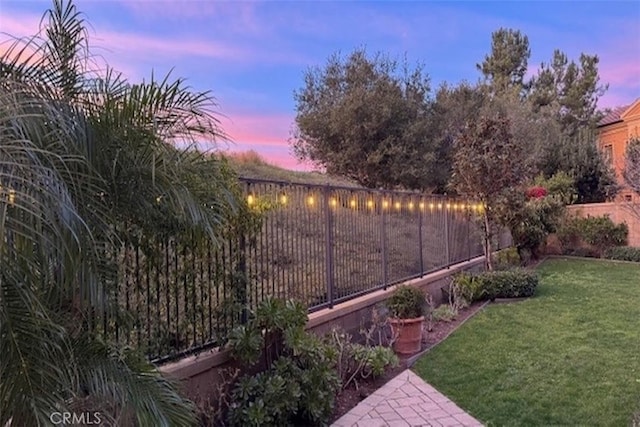 view of yard with a fenced backyard