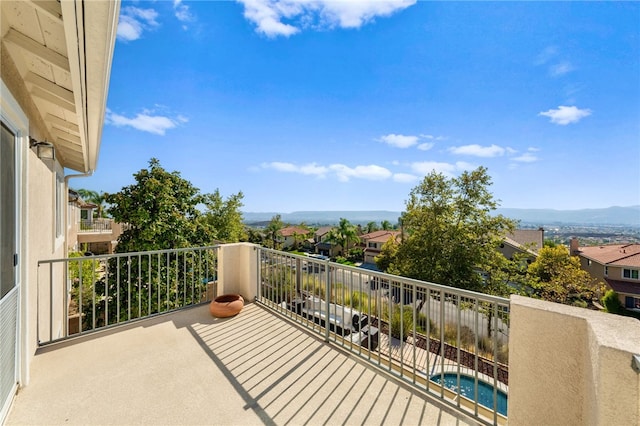 balcony featuring a residential view