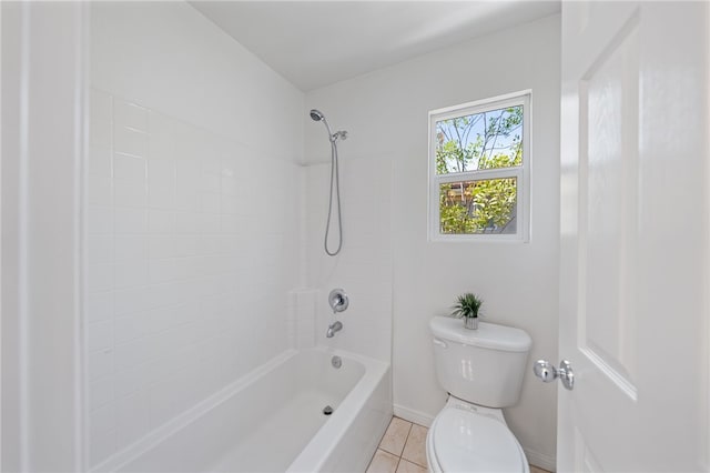 bathroom featuring toilet, shower / bath combination, tile patterned flooring, and baseboards