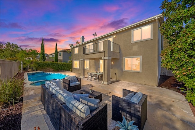 view of pool featuring a fenced in pool, outdoor dining space, a patio area, a fenced backyard, and an outdoor living space