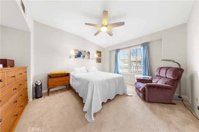 bedroom with visible vents, light carpet, baseboards, and vaulted ceiling