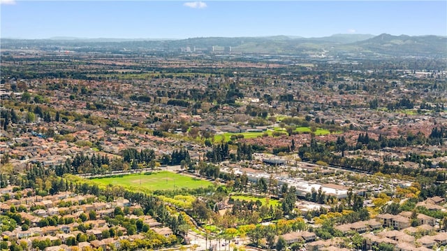 drone / aerial view featuring a mountain view