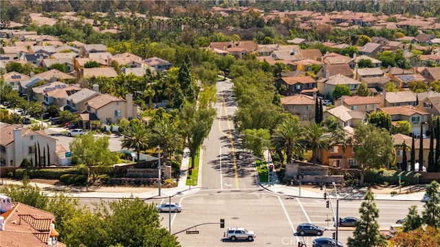 birds eye view of property with a residential view