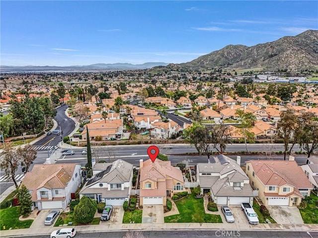 bird's eye view with a residential view and a mountain view