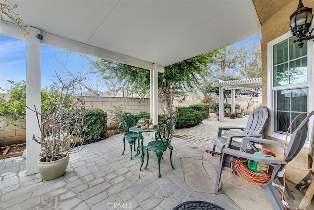 view of patio with a fenced backyard and a pergola