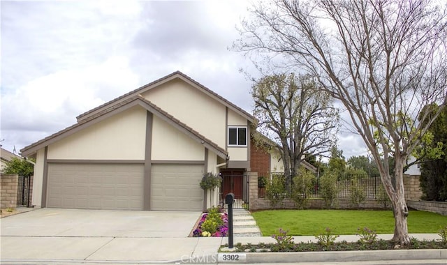 view of front of house with stucco siding, a front lawn, fence, concrete driveway, and a garage