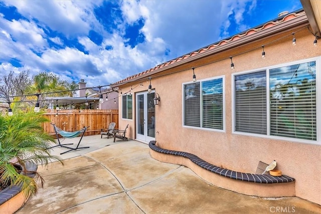 view of patio with fence