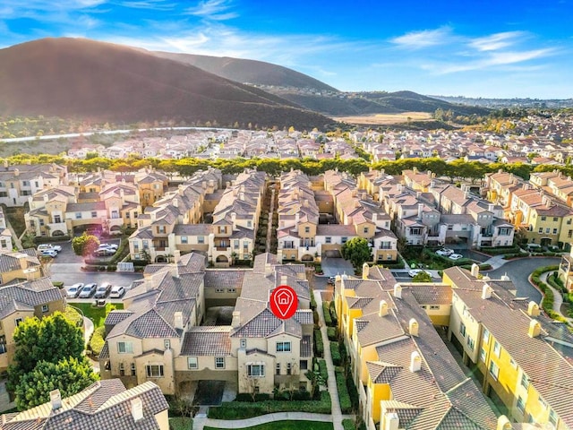 aerial view featuring a residential view and a mountain view