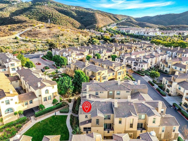 bird's eye view featuring a residential view and a mountain view